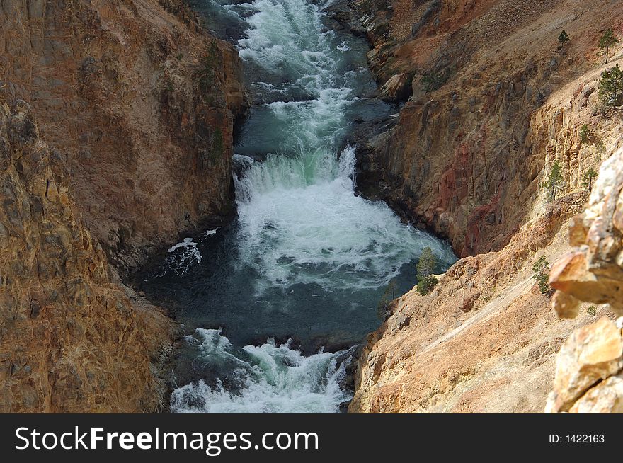 Water cascading down the rocks in Yellowstone National Park. Water cascading down the rocks in Yellowstone National Park