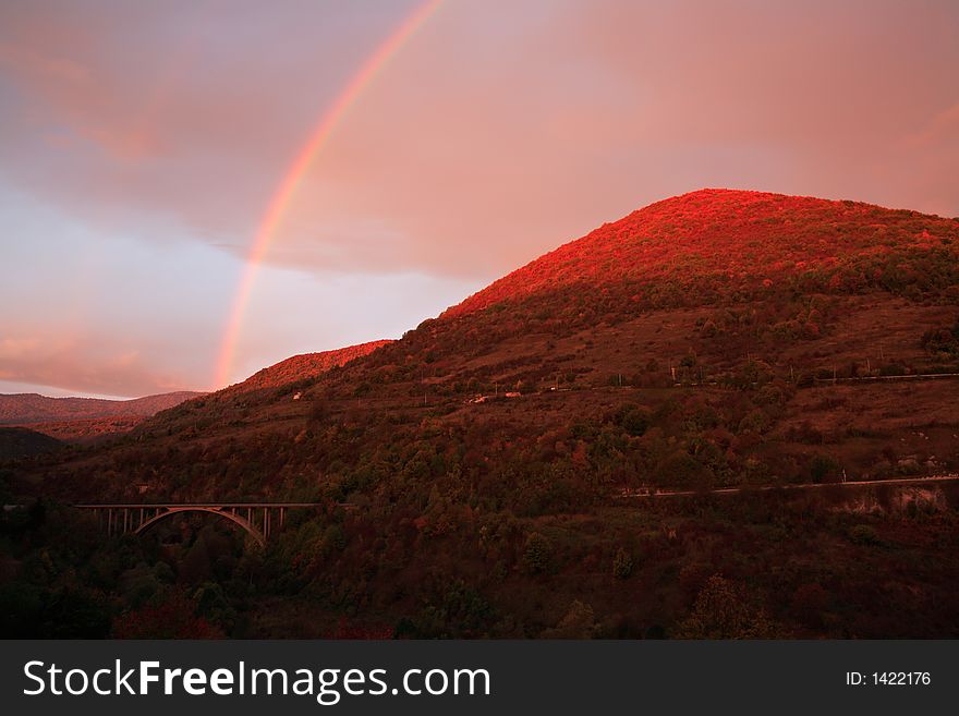 Sunrise With Rainbow