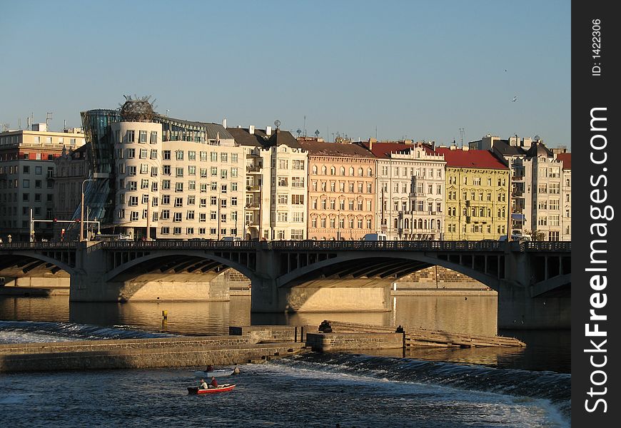 The Dancing house and other houses in Prague. The Dancing house and other houses in Prague