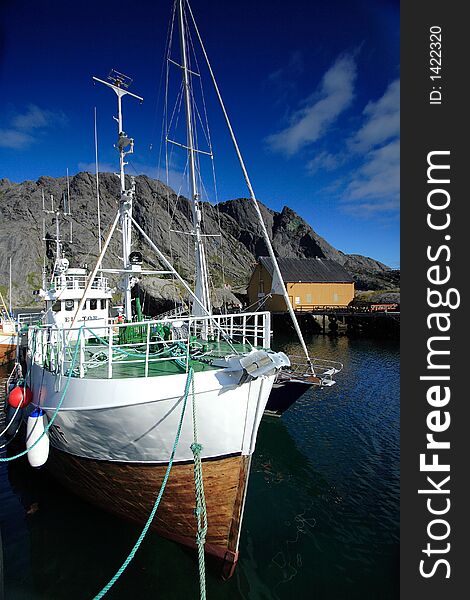 Begining of september at Nussfjord in the Lofoten Islands. Boats are quiet before winter (the season of fishing). Begining of september at Nussfjord in the Lofoten Islands. Boats are quiet before winter (the season of fishing)