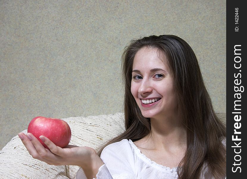 Pretty smiling woman with red apple. Portrait. Pretty smiling woman with red apple. Portrait.