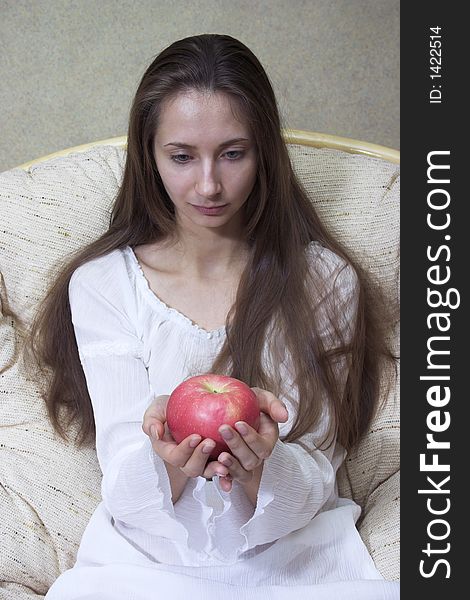 Pretty smiling woman with red apple. Portrait. Pretty smiling woman with red apple. Portrait.