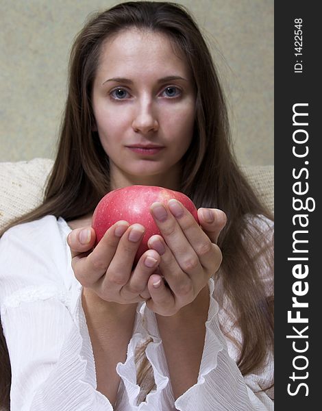 Pretty smiling woman with red apple. Portrait. Pretty smiling woman with red apple. Portrait.