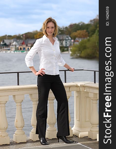A young successful businesswomen posing outdoors. A young successful businesswomen posing outdoors.