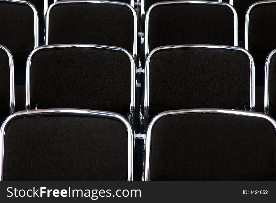 Close-up of black business chairs