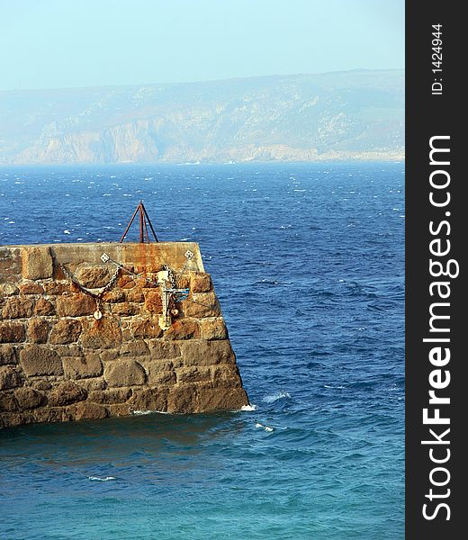 Cornish harbour wall on a sunny day