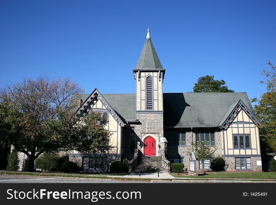 A nice urban Presbyterian church against blue sky