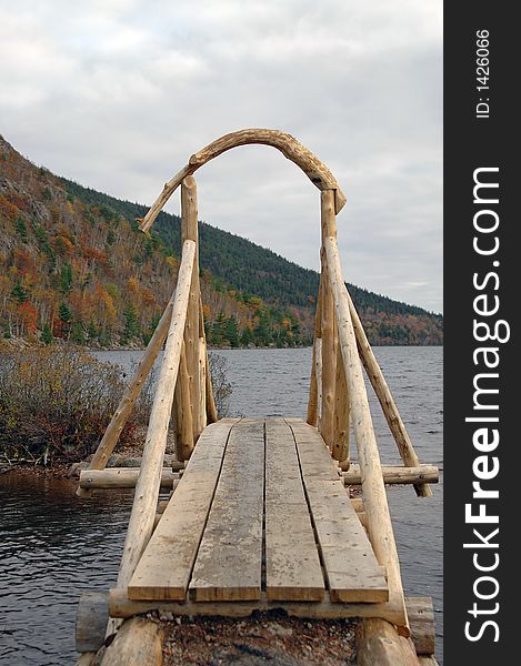 Wooden Bridge at Jordan Pond in Acadia National Park, Maine in Autumn.