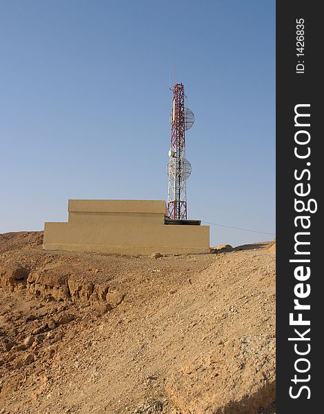Tower GSM of communication in desert in mountains. Tower GSM of communication in desert in mountains