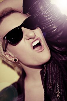 Young Rock Star Screams In Anger Royalty Free Stock Images