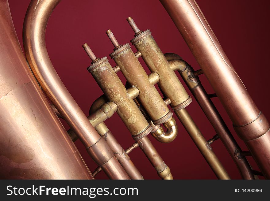 A detail of an old euphonium (from the tuba family). A detail of an old euphonium (from the tuba family).