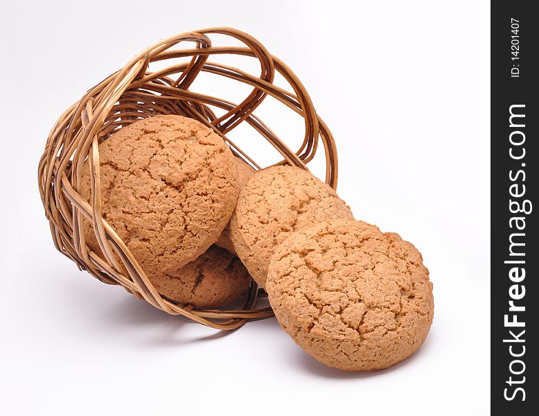 An avenaceous thin captain is spilled from a basket on a white background. An avenaceous thin captain is spilled from a basket on a white background