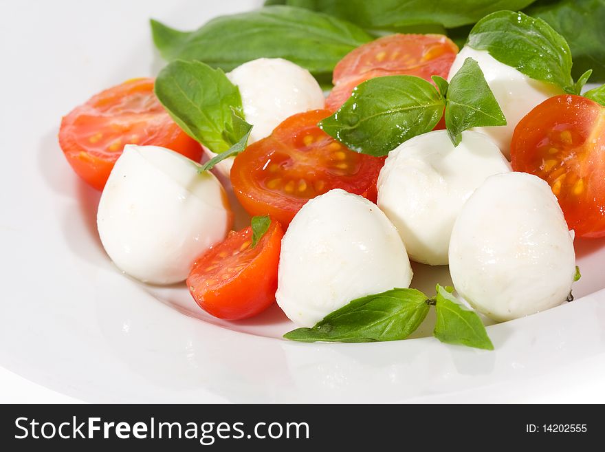 Salad with mozzarella and tomatoes