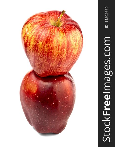 Pyramid of two apples on white background. Pyramid of two apples on white background