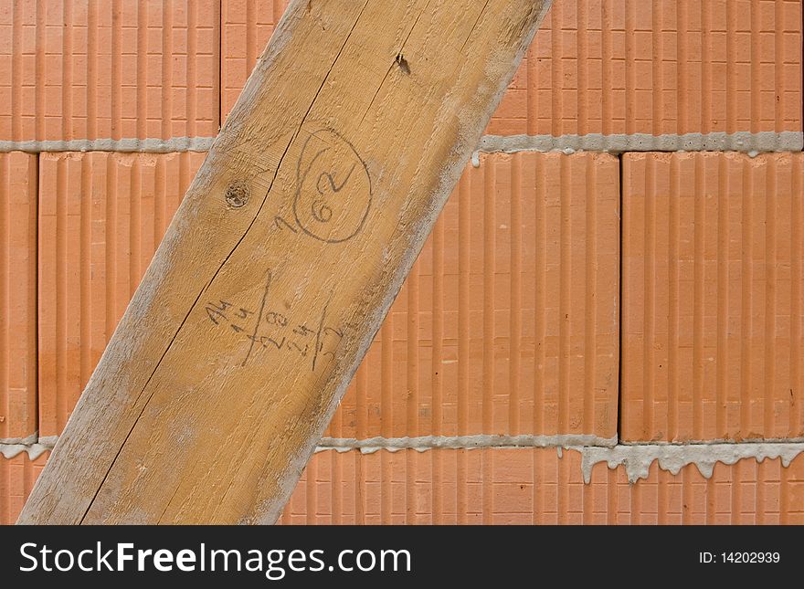 Hohlziegel-Wand mit Skizzenbrett Hollow brick wall with board. Hohlziegel-Wand mit Skizzenbrett Hollow brick wall with board