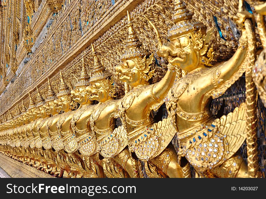 The garuda on wall of emerald buddha temple .there are arounding temple and made from gold,historical temple of thailand.
