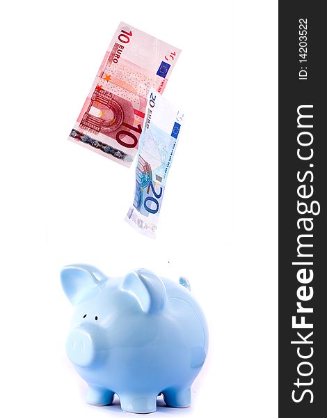 Piggy Bank With Falling Notes on Isolated White Background