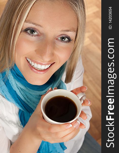 Caucasian woman with cup of coffee