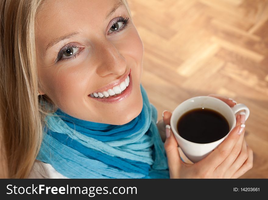 Caucasian woman with cup of coffee