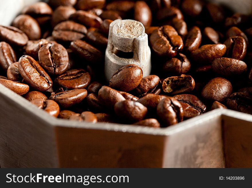 Photo of zoomed brown coffee beans which are all closed to each other