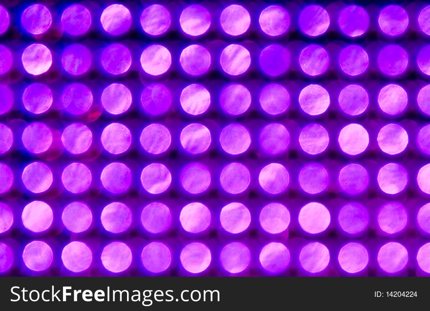 Blurry pattern of purple decoration lights. Blurry pattern of purple decoration lights.