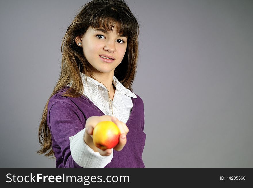 One School Girl Offering Healthy Fruit