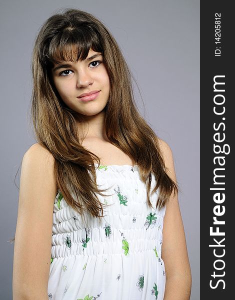 Beautiful teenager posing in studio with clothes. Beautiful teenager posing in studio with clothes