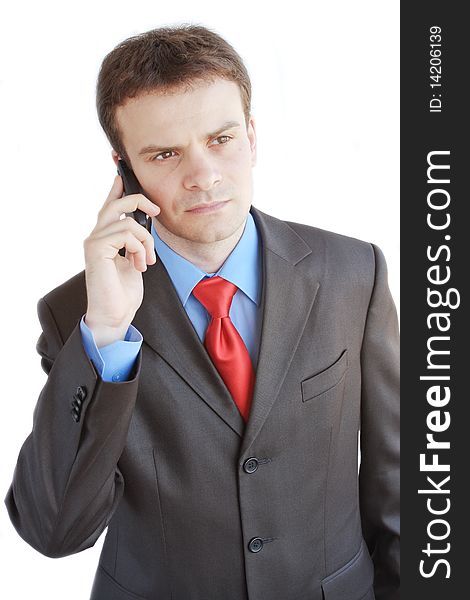 The businessman speaking by phone