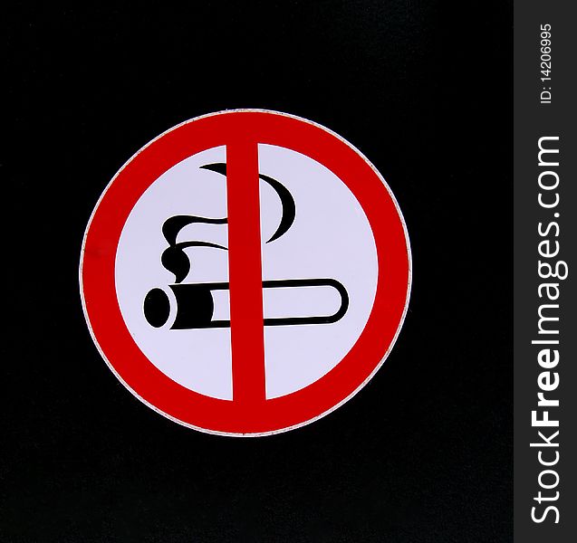 No smoking sign on a black background.