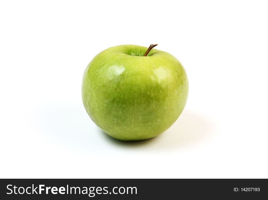 Delicious green apple on white background.