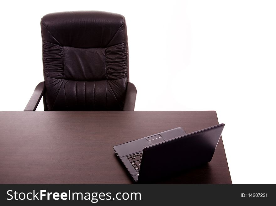 Laptop in a office desk, on white background