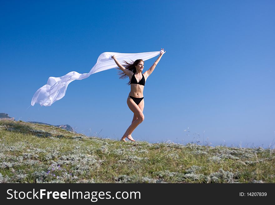 Woman With White Material And Nature