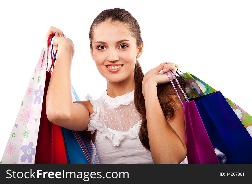 Young beautiful woman with many color packages. Young beautiful woman with many color packages