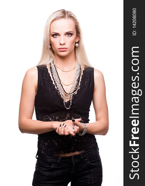 Young beautiful woman in black clothes and necklace. Young beautiful woman in black clothes and necklace