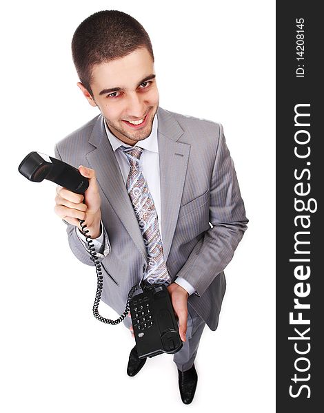 Portrait of young businessman with black telephone. Portrait of young businessman with black telephone
