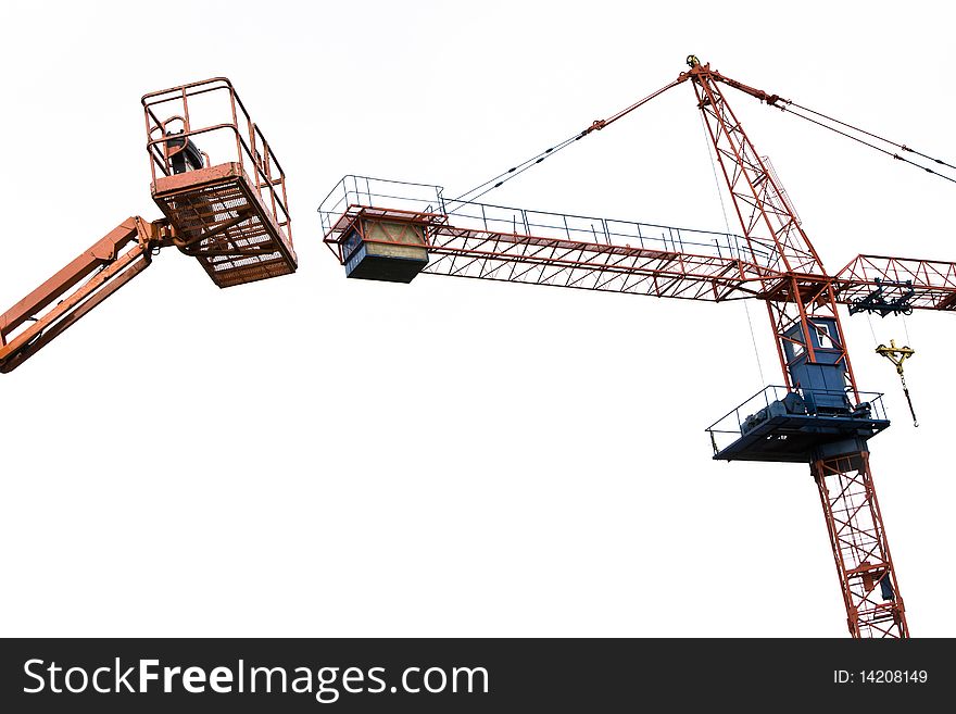 Crane and cherry picker against a white back ground