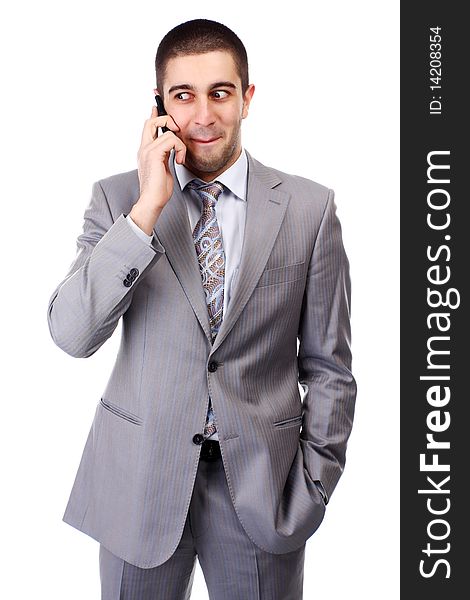 Young man in grey suit with mobile phone. Young man in grey suit with mobile phone