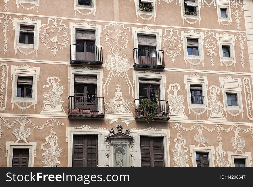Decoration of the early nineteenth century on the facade of a house in Barcelona. Decoration of the early nineteenth century on the facade of a house in Barcelona