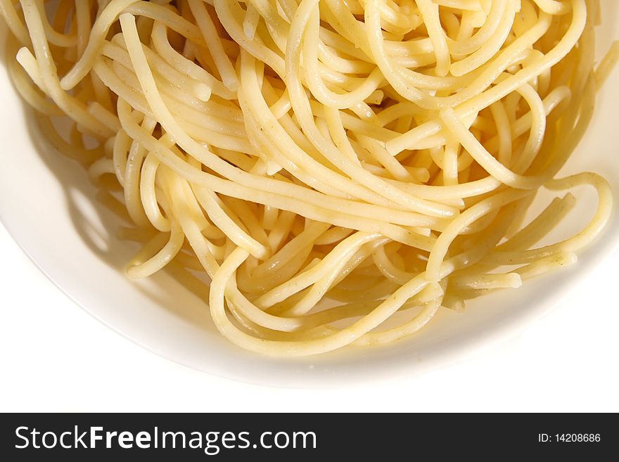 Bowl of cooked spaghetti isolated on white. Bowl of cooked spaghetti isolated on white