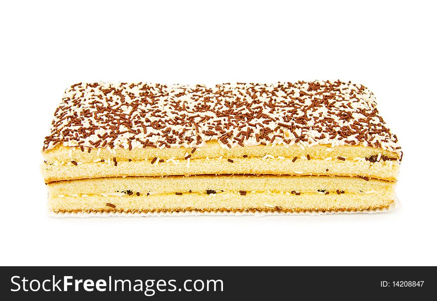 Coconut and chocolate sponge cake. Isolated over white background. Coconut and chocolate sponge cake. Isolated over white background.