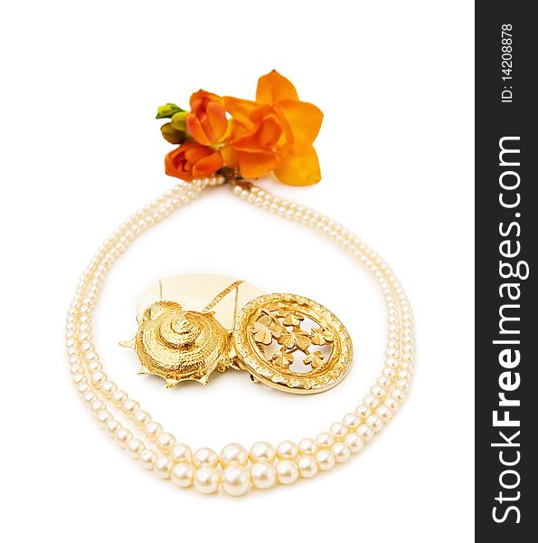 Vintage jewellery with brooches and pearls. Isolated over white background. Vintage jewellery with brooches and pearls. Isolated over white background.
