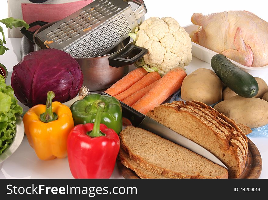 Bread, carrot, red cabbage and peppers in close up. Bread, carrot, red cabbage and peppers in close up