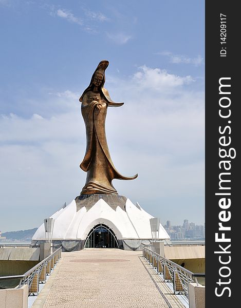 Kun Iam Statue is a 32-metre tall statue of the goddess of mercy, a much revered deity in Macau. It is located on a manmade island off the Macau peninsula, and linked to it by a 60-metre causeway. Geomancy was employed to determine the most auspicious location to position the statue, to align it with Guia Hill and the Kun Iam Temple. The Kun Iam statue is clad in bronze. It weighs 50 tonnes and is 20 metres tall. It was cast at a foundry in Nanjing, one of the largest foundries in China.