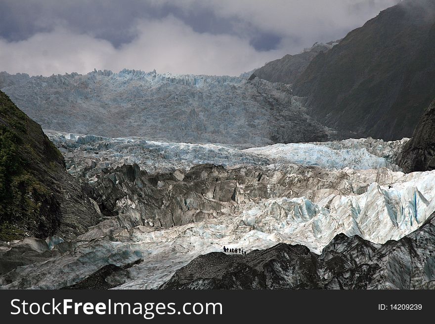 Hikers On Ice Falls On Franz Joseph Glacier