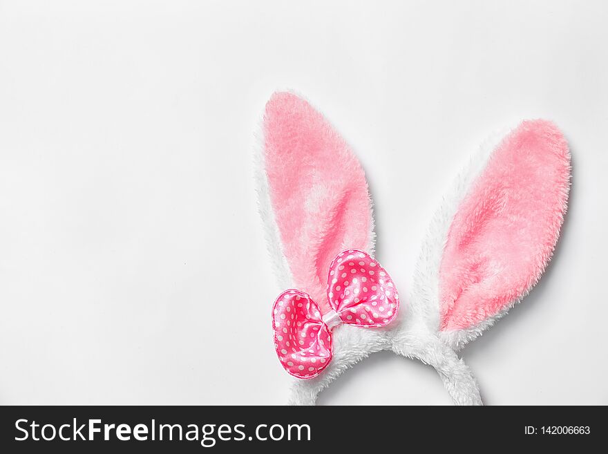 Funny headband with Easter bunny ears on white, top view