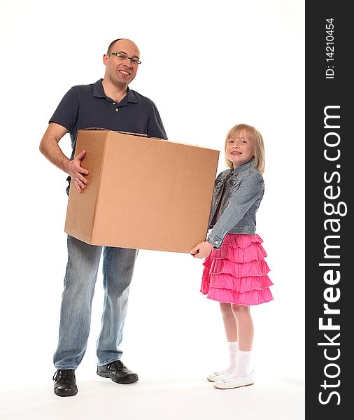 Young little girl carrying large box with father. Young little girl carrying large box with father