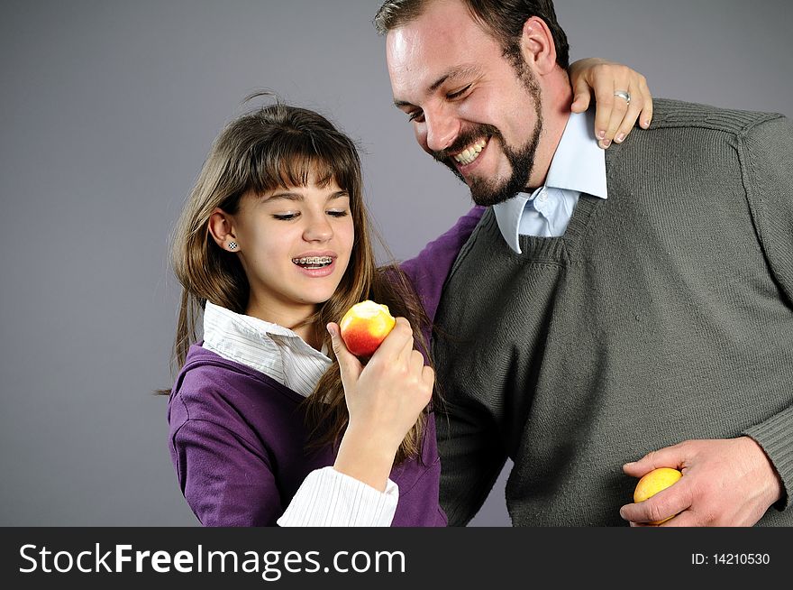 Cheerful Family Eating Healthy Fruits
