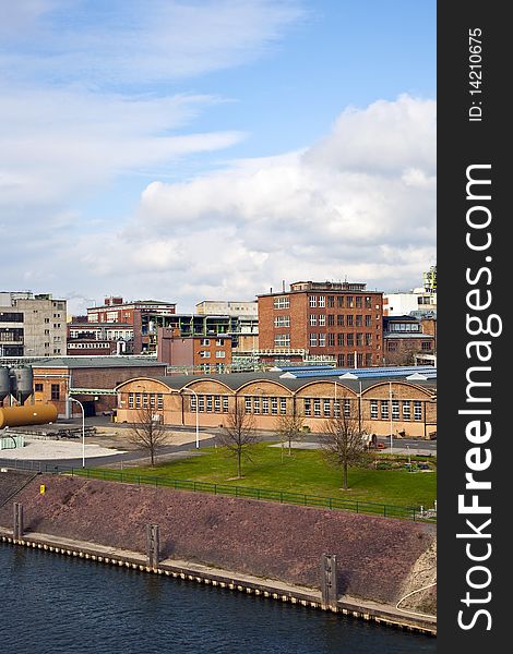 Old industrial building with bricks and river