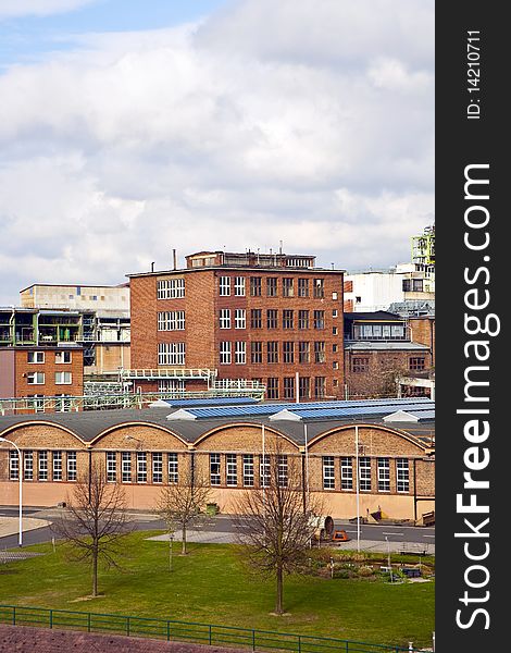 Old industrial building with bricks and river