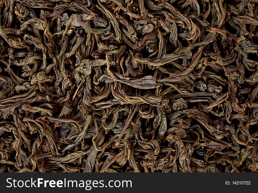 Close-up of dried black tea leaves as a background. Close-up of dried black tea leaves as a background